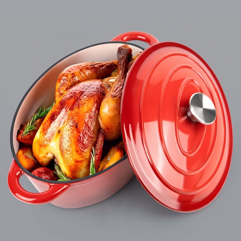 exclusive 4.5QT Enameled Dutch Oven Pot With Lid, Cast Iron Dutch Oven With Dual Handles For Bread Baking, Cooking, Non-stick Enamel Coated Cookware 7 A high-angle, 3/4 view of a bright red oval Enameled Dutch Oven Pot With Lid. The pot contains a whole roasted chicken and root vegetables like potatoes and carrots, garnished with rosemary. The matching red lid, with a stainless steel knob, is positioned next to the pot on a grey background.