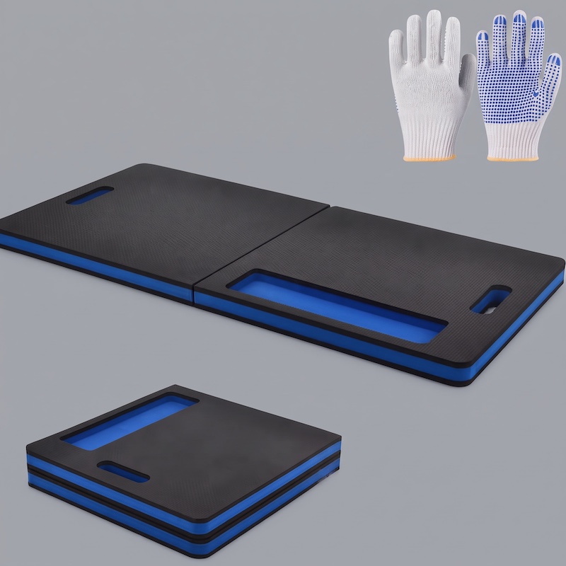1/2pcs EVA Car Repair Work Mat - Foldable, Lightweight, Insulated, High Quality, Multi-purpose Mat, Suitable for Outdoor Repairs, Camping, Hiking - 1145mm X 400mm X 30mm, Portable Ergonomic Design, Durable EVA Material Mat, Multi-functional. 7 A clean product shot of the large, unfolded Car Repair Work Mat and the smaller, folded block mat, positioned on a gray surface with a pair of white and blue dotted work gloves in the upper right corner.