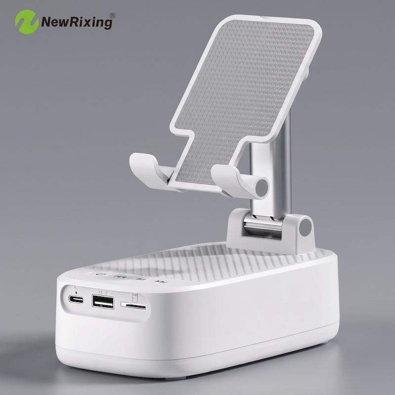 NewRixing 6W Wireless Speaker with Phone Holder, TWS Dual Pairing, 1800mAh Battery, Hands-Free Calling, Portable Power Bank, 6-Hour Playtime, Hi-Fi Sound Quality, Loud Stereo & Deep Bass, USB-C Charging, Indoor/Outdoor Use, Adjustable Stand, Durable 8 Studio product shot showcasing the front view of the white color Wireless Speaker with Phone Holder on a smooth gray background, displaying its ports and sleek foldable stand.
