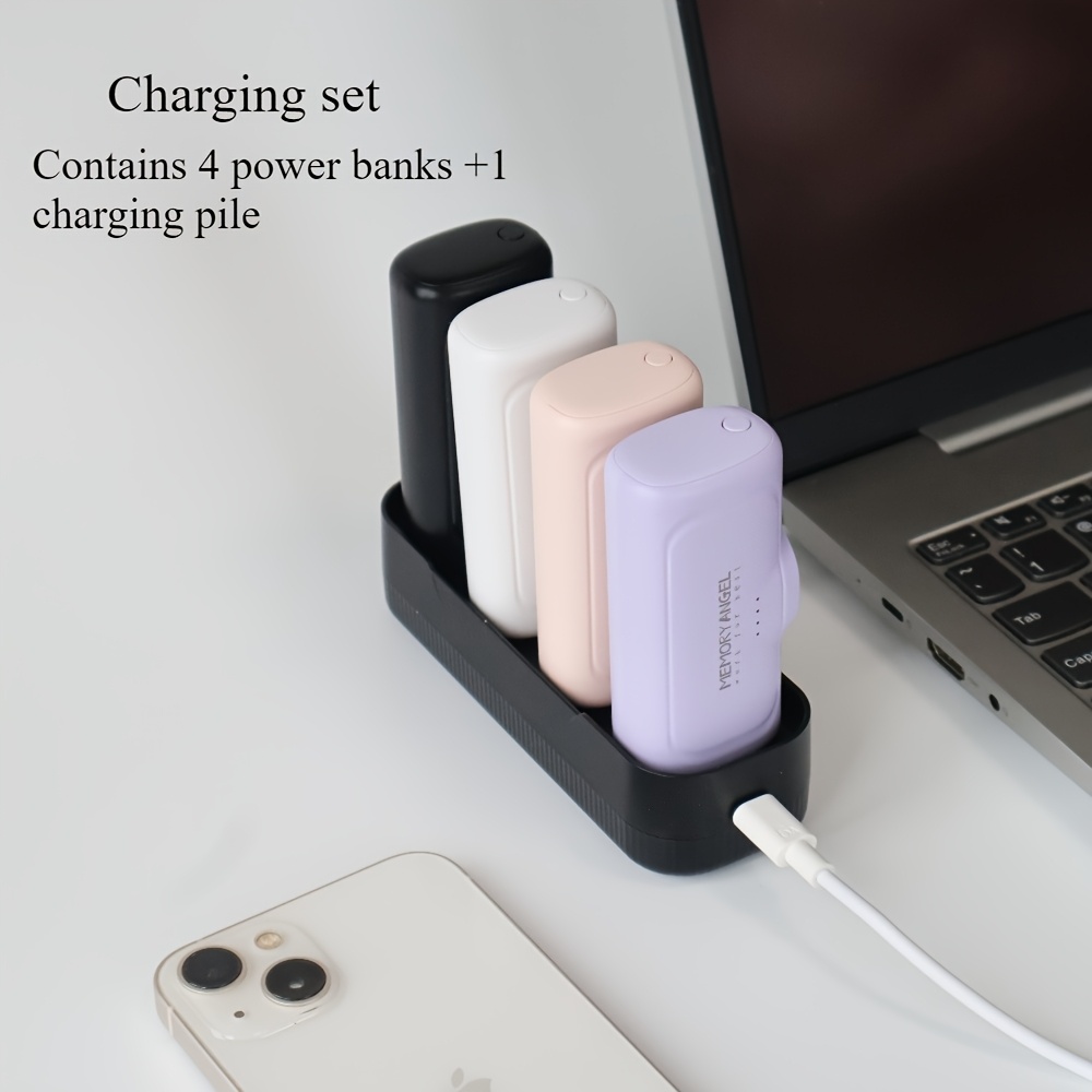 22.5W Fast Charging 5000/10000mAh Mini Portable Charger -5000mAh Optional 1/2/4pcs USB-C Power Bank with Charging Station.The compact desigin 4 Fast mini power bank charger set featuring four colorful capsule units (purple, pink, white, and black) and a central 4-slot charging dock.