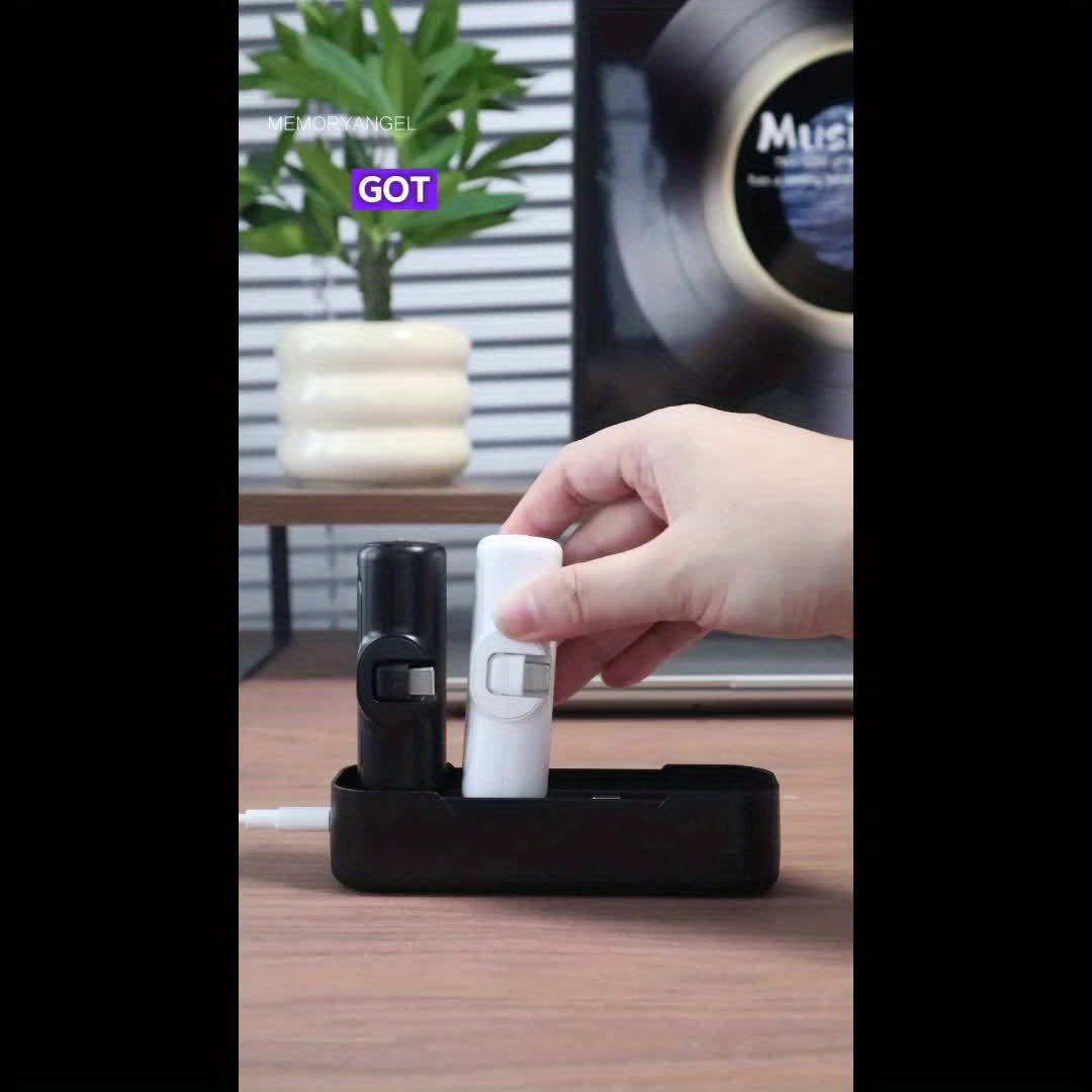 22.5W Fast Charging 5000/10000mAh Mini Portable Charger -5000mAh Optional 1/2/4pcs USB-C Power Bank with Charging Station.The compact desigin 6 Mini power bank charger dock station featuring a black and white capsule power bank being placed into a central charging base.