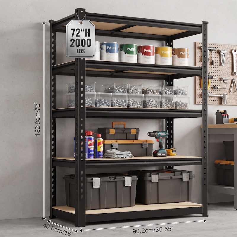 Three-quarter view of a black 2000 Capacity Heavy-Duty 5-Tier shelving unit in a workshop against a concrete wall, next to a pegboard with tools. The shelves hold paint cans, clear bins of screws, toolboxes, and a drill. Two large grey interlocking tool chests are on the bottom shelf. White measurement lines show dimensions: "182.8cm/72"" height, "40.6cm/16"" depth, and "90.2cm/35.55"" width. A silver metal tag hangs from the top left post displaying "72"H" and "2000 LBS".