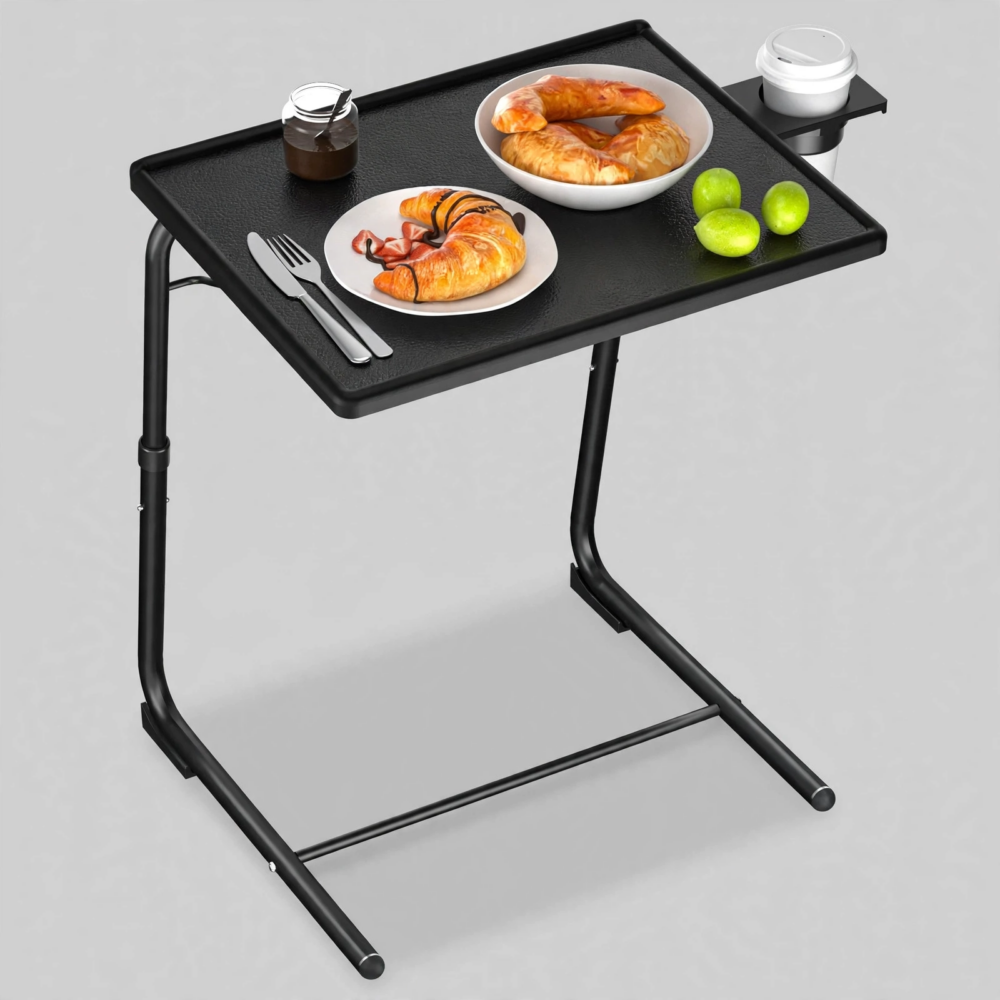 A clear front view of the black 1pc upgrade Adjustable Folding Table loaded with plates of croissants fruit and a coffee cup