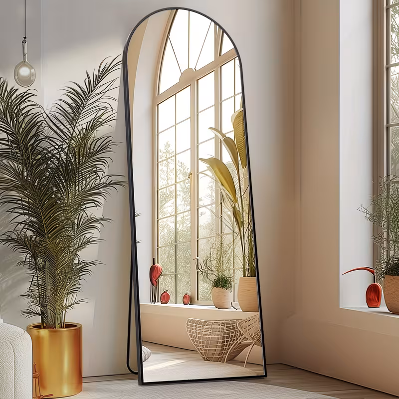 Arched Full Length Mirror with Free Standing & Leaning/Hanging Mount - Tall Vertical Oval Arch Design, Full-Body Mirror Suitable for Living Room, Bedroom, Cloakroom - Modern Simple Aluminum Frame Vertical Mirror 2 A black color Arched Full Length Mirror with Free Standing setup reflecting a sunny arched window and indoor plants in a bright cozy room