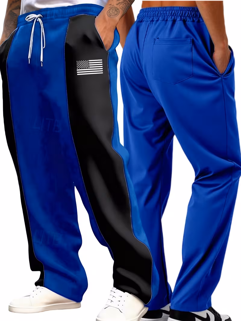 Men'S Color-Blocked Casual Pants Feature a Stylish Design with Comfortable And Structured Fabric. The Drawstring Waist Fits The Body Well, Making It Trendy And Eye-Catching. with a Loose Straight Cut 11 Front and rear model layout demonstrating the fit of the black and blue color-blocked joggers.