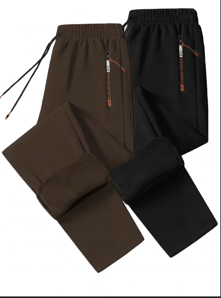 comfortable 2pcs Men's Winter Warm Fleece Sweatpants with Zipper Pockets Casual Trousers Track Pants Drawstring Waist for Running Workout Gym Outdoors for Fall Winter 6 A professional flat lay studio photograph over a white background featuring a two piece collection of comfortable Men’s Winter Warm Fleece Track Pants in deep brown and solid black. The pants are styled overlapping each other, with the low leg segments of both pairs flipped up neatly to reveal thick, color matched inner fleece insulation linings. The elastic waistbands display extended black drawstrings adjacent to high contrast vertical side pockets featuring orange zipper pulls.