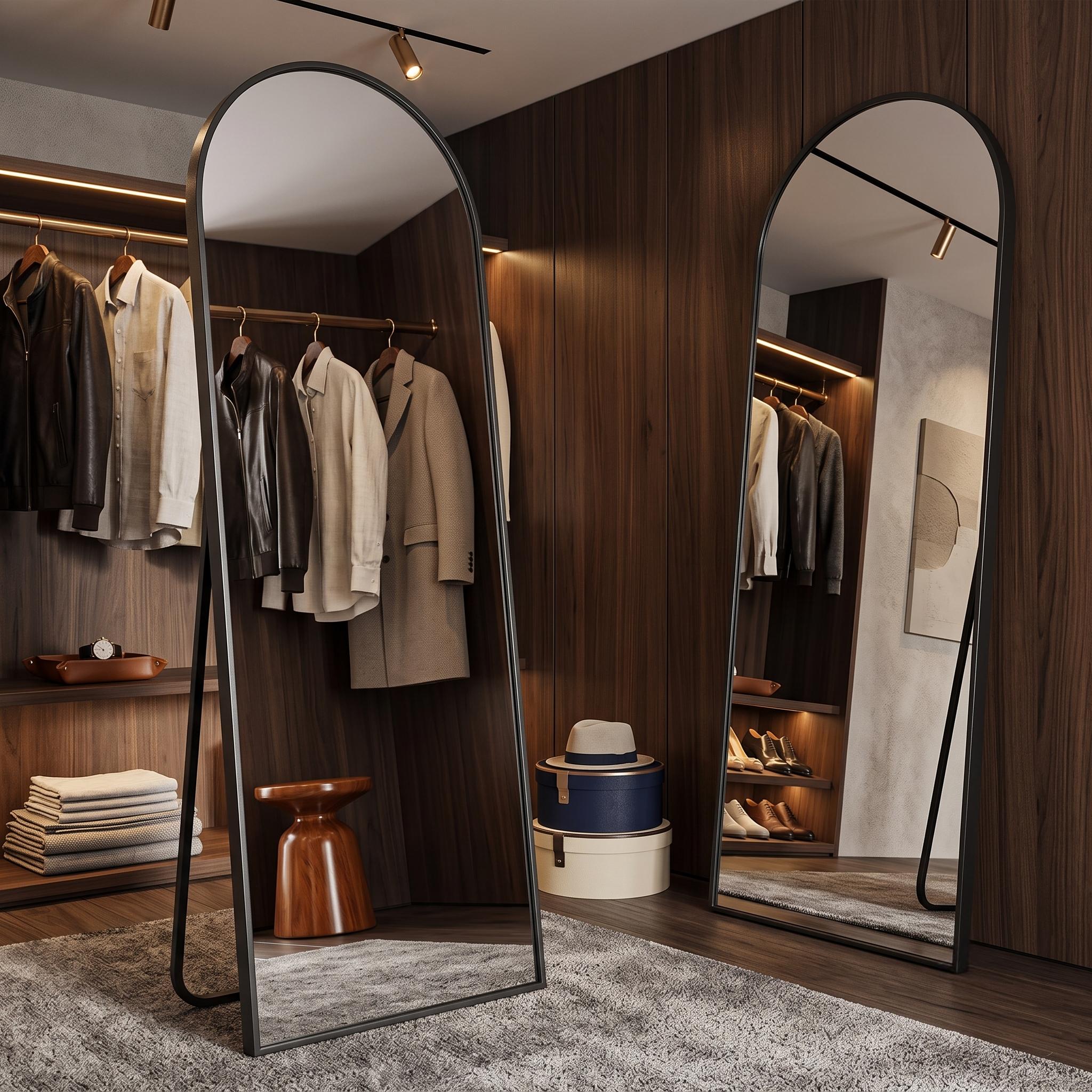 Arched Full Length Mirror with Free Standing & Leaning/Hanging Mount - Tall Vertical Oval Arch Design, Full-Body Mirror Suitable for Living Room, Bedroom, Cloakroom - Modern Simple Aluminum Frame Vertical Mirror 5 Two black color Arched Full Length Mirror with Free Standing units positioned inside a dark wood luxury wardrobe room reflecting elegant clothing