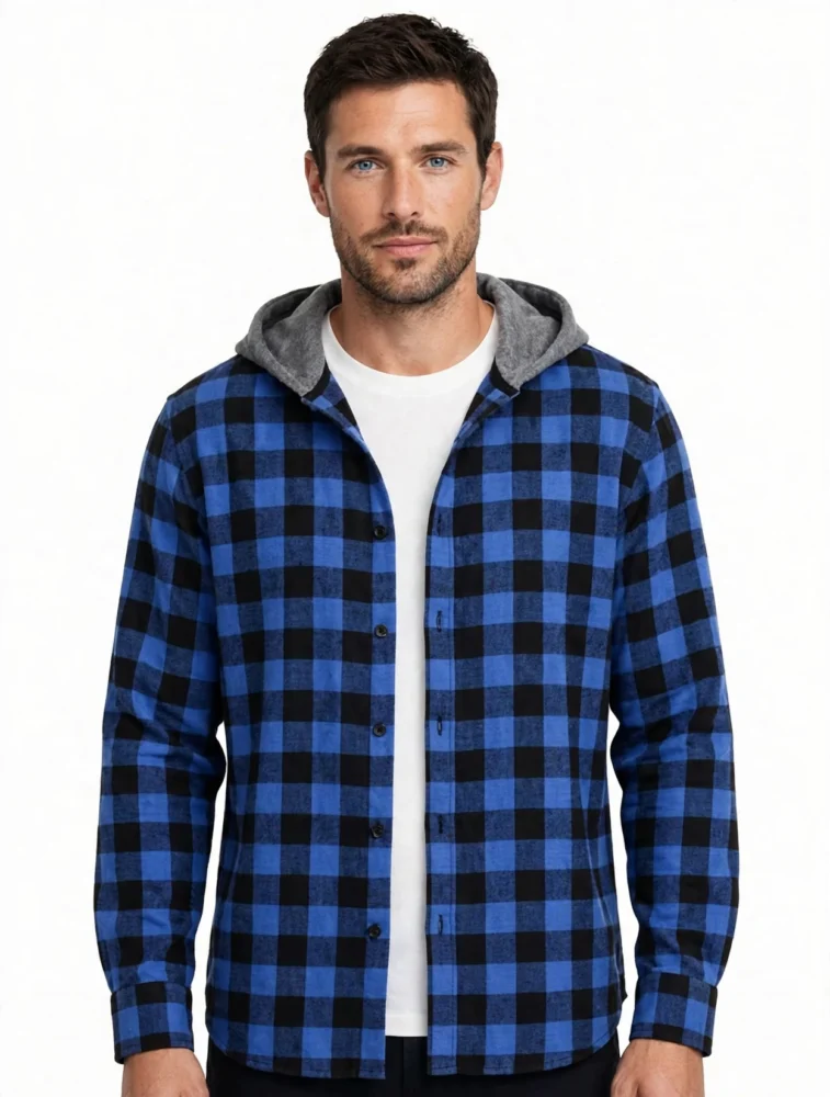 A close up front view of the upper torso of a male model wearing a black and white plaid shirt hoodie over a white t shirt.