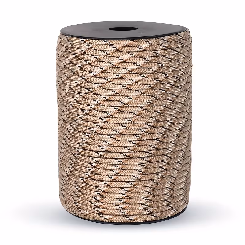 The Ultimate 164ft Roll of 9-Strand Rope 4mm: Heavy-Duty Utility Cord for Tents & Tarps 8 A high-strength, premium desert color Roll of 9-Strand Rope 4mm, neatly wound on a spool against a clean background, featuring detailed call-out boxes showcasing its construction. The upper call-out shows a cross-section of the ultra-resistant core and is labeled "9-STRAND HIGH-TENSILE CORE