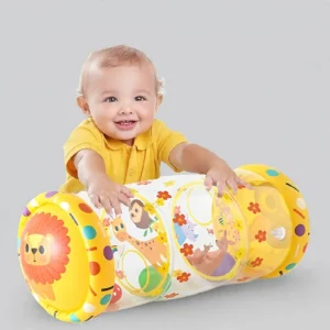 Top down view of a baby girl in yellow reaching for clear Crawling Toys for Children on an alphabet playmat