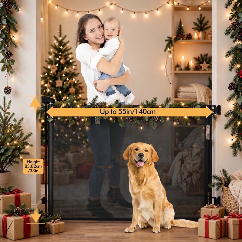 Retractable Gate Mesh Gate A woman holding a baby with a golden retriever sitting in front of a black 33x55 Inch Retractable Gate Mesh Gate in a holiday-decorated room.