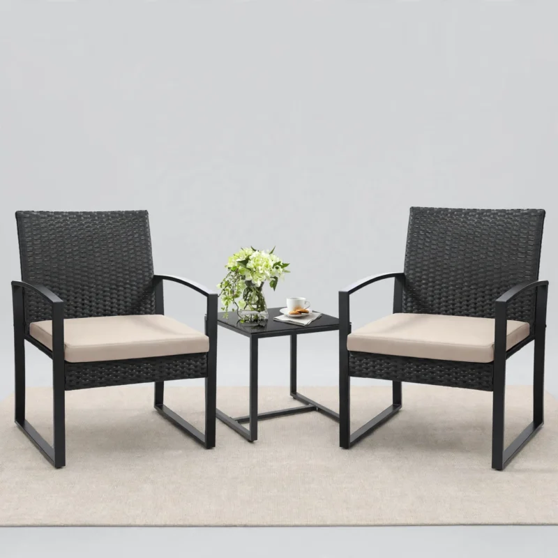 3pcs Rattan Bistro Set Outdoor Patio Furniture Conversation Set Featuring 2 Chairs And 1 Safety Glass Top Table, with Plush Cushions, on, Perfect for Your Backyard 8 A straightforward view of an outdoor set featuring 2 Chairs And 1 Safety Glass Top Table styled with light beige cushions on a simple mat.