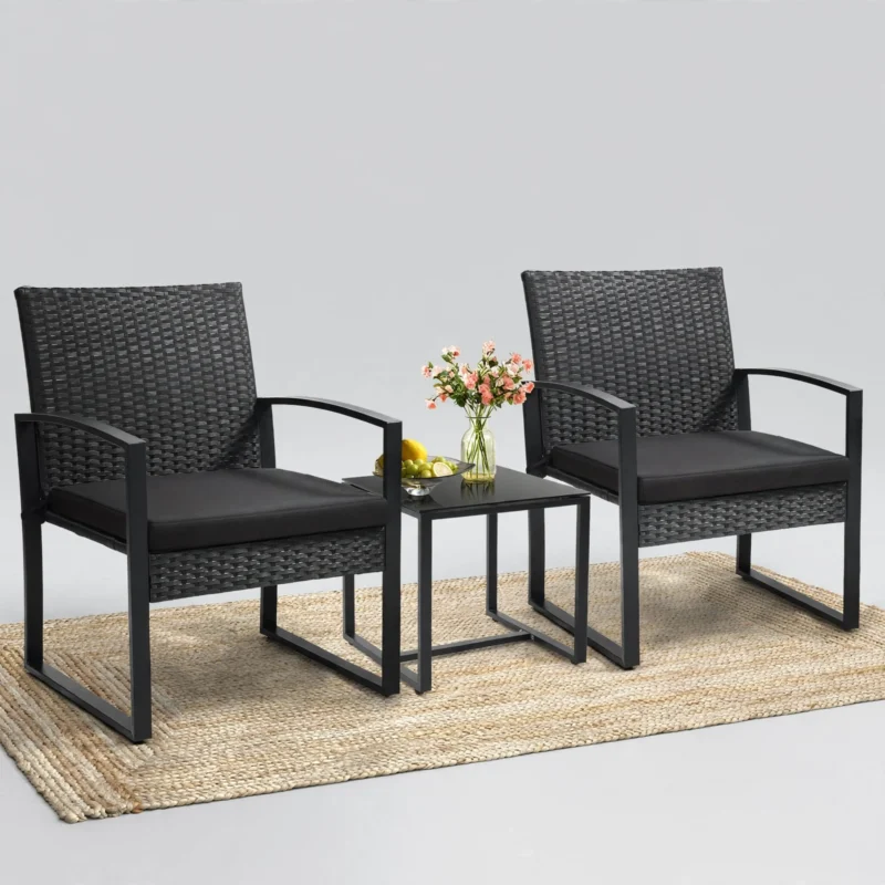 3pcs Rattan Bistro Set Outdoor Patio Furniture Conversation Set Featuring 2 Chairs And 1 Safety Glass Top Table, with Plush Cushions, on, Perfect for Your Backyard 7 A front facing view of a black rattan patio set featuring 2 Chairs And 1 Safety Glass Top Table with matching black cushions.