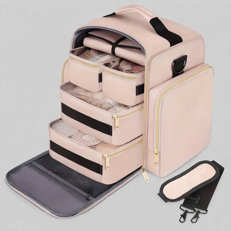 Front view of an open pink Makeup Bag Cosmetic Bag Organizer displaying its stacked inner pouches and transparent compartments on a gray background.