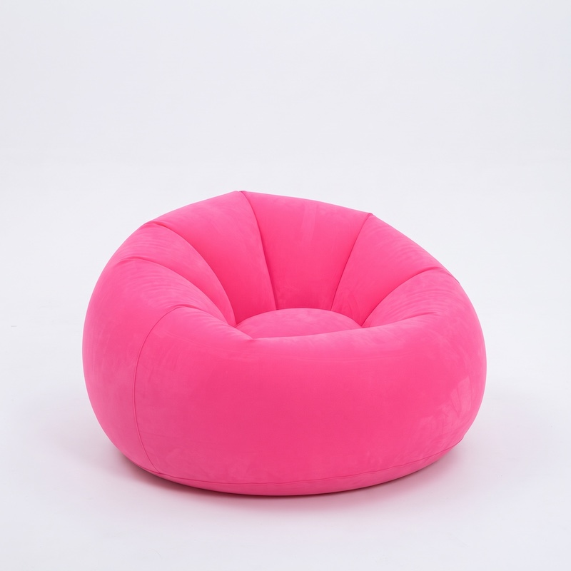 A Large Inflatable Lazy Sofa Chair, Made of PVC Bean Bag Material, Suitable for Indoor And Outdoor Seating 12 A vibrant, flocked pink color Inflatable Lazy Sofa Chair with a rounded, supportive design, shown isolated against a plain white studio background.