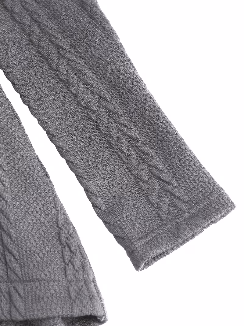 useful Sophisticated Decorative Buttoned Long Sleeve Top | Modern High Neck Knit for Business Casual 7 Sleeve Detail: A high-resolution close-up of the long sleeve on a gray decorative buttoned top, showcasing a thick, vertical cable knit braid and a ribbed cuff on a soft heathered fabric.