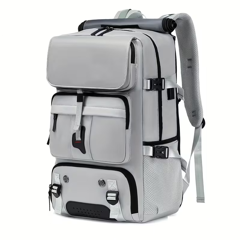 One Large Capacity Laptop Backpack, Designed for Both Men And Women, Featuring a Multifunctional Travel Design with a Compartment for Shoes, Ideal for Business Trips, Travel, College, Holiday Travel, Party Gifts, School Use 6 A professional studio front three quarter view of a grey color One Large Capacity Laptop Backpack standing upright on a white background. The bag features clean grey textile fabric, multi tiered zipped front storage pockets, dual side compression straps with heavy duty buckles, and a light grey mesh bottle holder.