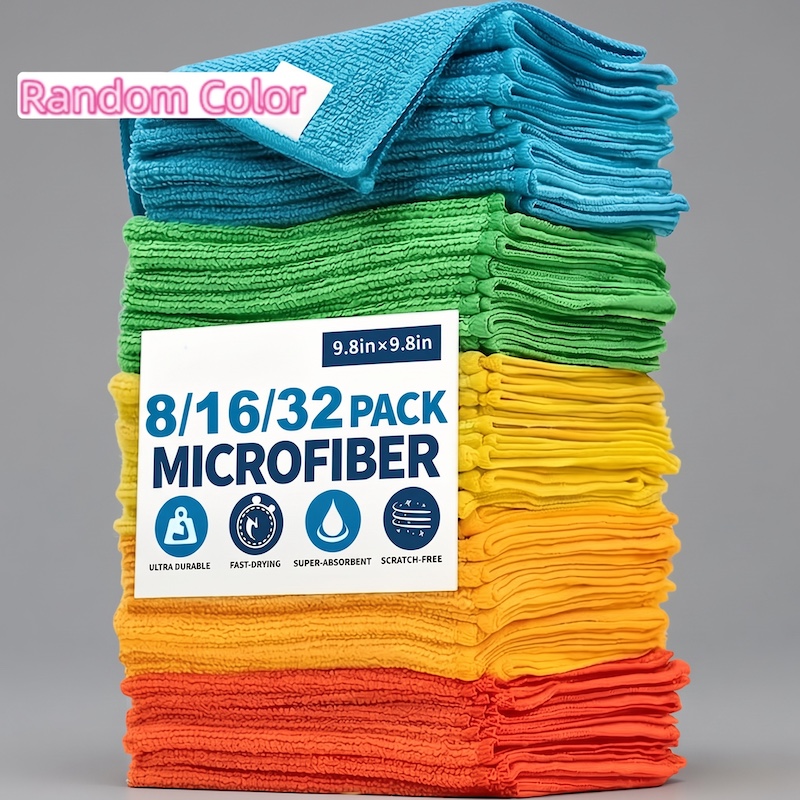 Microfiber Cloths Super Absorbent hanging and air-drying neatly on a laundry rack indoors.
