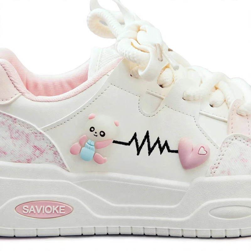 Women's White Platform Sneakers - Chunky Platform Shoes with Upper & PVC Sole, Lace-Up Mid-Top Casual Athletic Wear Suitable for Spring/Autumn, - Comfortable Footwear, Women Shoes 14 A close-up shot focusing on the side panel of a single pink color Women's White Platform Sneakers, highlighting the panda charm and heartbeat graphic.