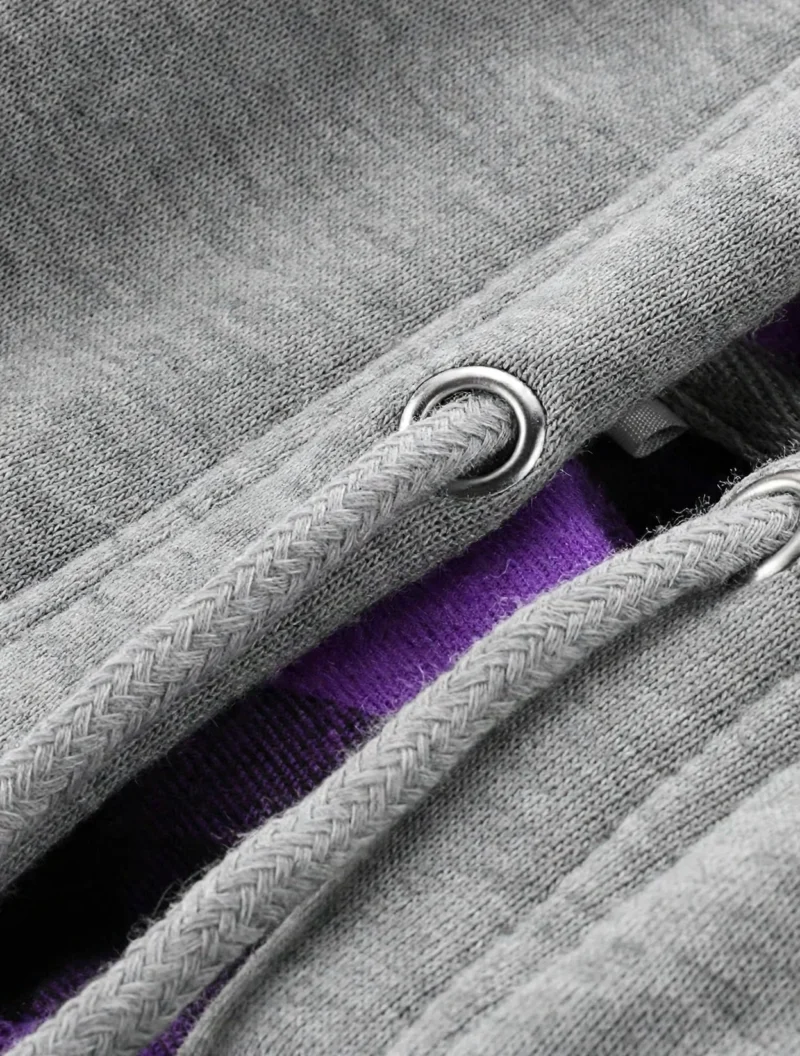 2pcs Men's New York Fashion Trendy Plaid Shirt Hoodie, Plaid Pullover Sweatshirt Flannel Hoodie 12 Macro close-up shot of the silver metal eyelets and matching gray drawstrings on the gray hood of a purple and black fashion trendy plaid shirt hoodie.