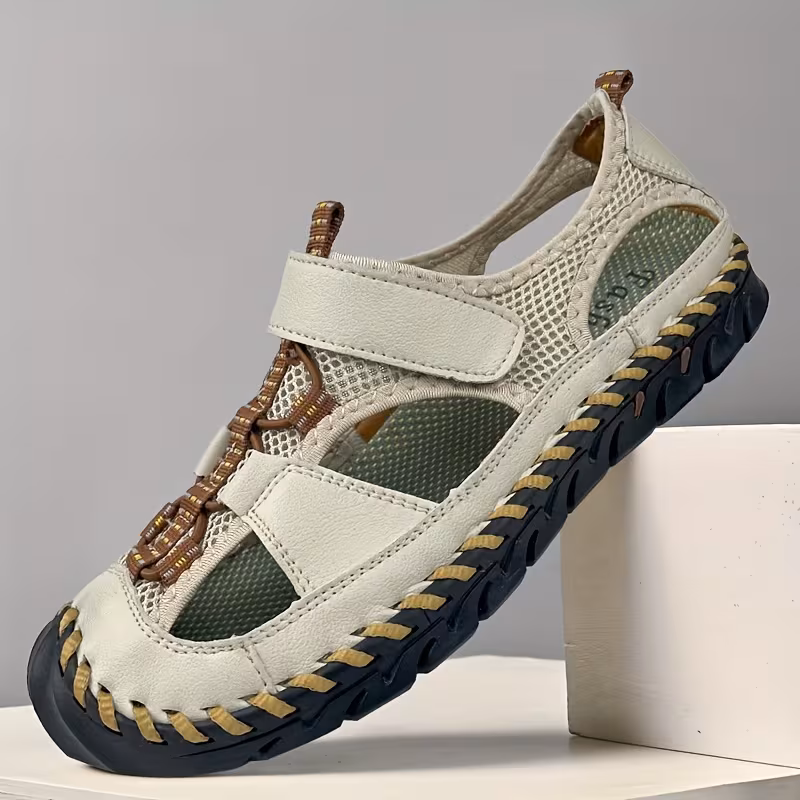 All-Terrain Casual Sports Sandals: Solid Color, Slip-Resistant Rubber Sole & Breathable Fiber Upper 11 A single light green color Casual Sports Sandals Solid Color with mesh panels and brown cord accents, resting with its toe on a white pedestal.