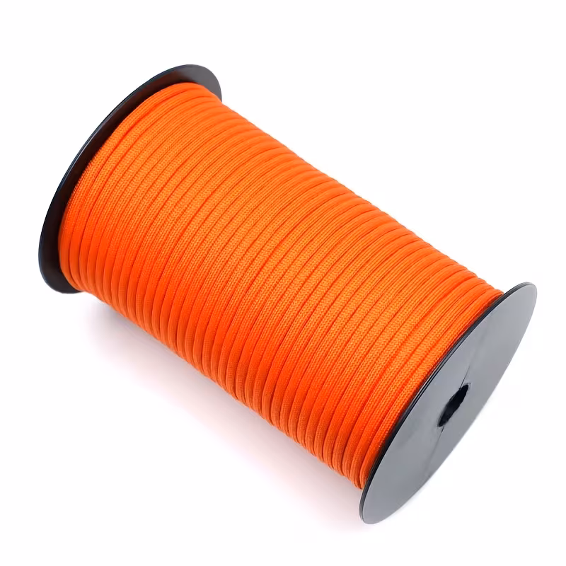The Ultimate 164ft Roll of 9-Strand Rope 4mm: Heavy-Duty Utility Cord for Tents & Tarps 14 A professional product photograph displaying a bulk orange color Roll of 9-Strand Rope 4Mm, neatly wound on a sturdy black plastic spool. The image is taken from an elevated angle against a clean, plain white background.