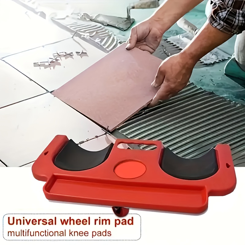 A Rolling Knee Board Platform with Wheels, Made of ABS Material, Featuring a Multifunctional Built-in Tool Tray and a Comfortable Cushion. Suitable for Mechanics, Carpenters, Flooring, and Automotive Repairs. Valentine's Day Gifts for Men 15 A close-up view of a red Rolling Knee Board Platform with Wheels designed for flooring and tiling work. The red platform has two curved, ergonomic black foam knee cups, a central handle, and a long rectangular tray at the front for tools and parts. A small, clear caster wheel is visible under the front of the platform. In the background, a person is shown kneeling and actively installing large square tiles on a floor covered with wet mortar. Text in a box at the bottom says: "Universal wheel rim pad multifunctional knee pads".