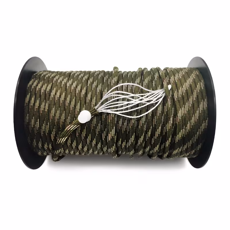 The Ultimate 164ft Roll of 9-Strand Rope 4mm: Heavy-Duty Utility Cord for Tents & Tarps 16 A high-strength olive green and beige patterned Roll of 9-Strand Rope 4mm wound on a black spool, with the frayed end demonstrating the nine individual inner strands and a white plastic bead, isolated on a white background.