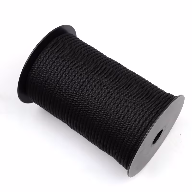 The Ultimate 164ft Roll of 9-Strand Rope 4mm: Heavy-Duty Utility Cord for Tents & Tarps 12 A professional product photograph of a substantial bulk roll of black, 4mm diameter utility rope, wound neatly on a black plastic spool and set against a clean white background.