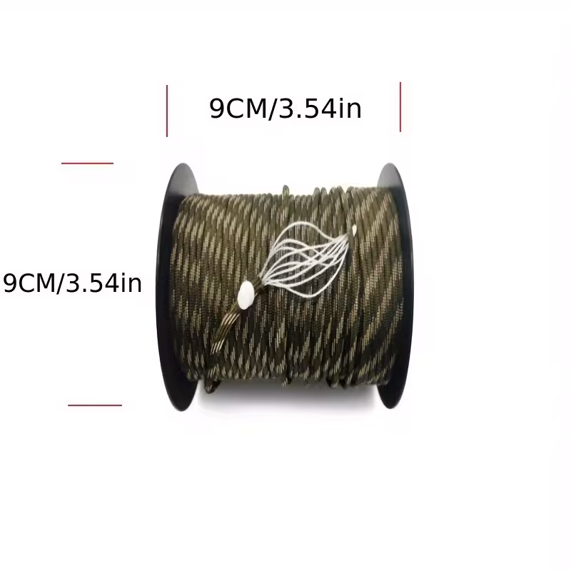 The Ultimate 164ft Roll of 9-Strand Rope 4mm: Heavy-Duty Utility Cord for Tents & Tarps 18 A high-strength woodland camouflage Roll of 9-Strand Rope 4mm wound on a black spool, with dimension arrows showing a spool diameter of 9cm (3.54in) and a spool height of 9cm (3.54in). A white elastic loop holds the inner strands together, all on a white background.