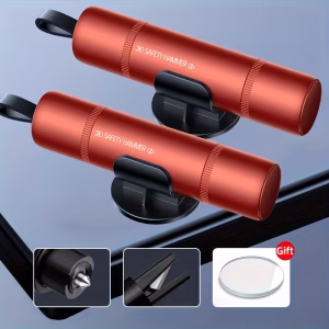 A high-standard technical product visualization of the Window Breaker and Seatbelt Cutter emergency tool. The dynamic black oval chassis is displayed against a metallic substrate, featuring high-fidelity callouts for integrated nodes including dual "Tungsten Steel Impact Points" (at the apex and base), an "Integrated Seatbelt Cutter Blade (recessed hook)," a "Key Chain Hole," and a "Key Chain Hook". The "QISHING" branding is visible on the textured polymer handle coordinate.
