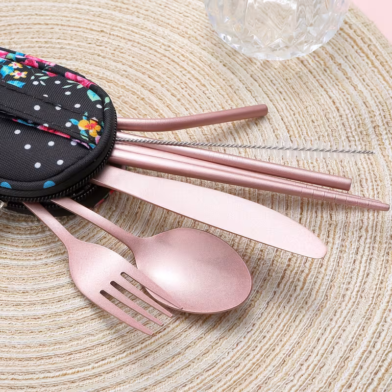reliable Unyielding Travel Utensils Reusable Silverware Set: Professional-Grade Stainless Steel Cutlery in a Weatherproof Armor Case 3 A professional product layout features the full Travel Utensils Reusable Silverware Set in a sleek, matte-finish silver color, set against a blurred outdoor backdrop. The set includes five full-sized pieces: a sturdy dinner fork, a versatile soup spoon, a serrated dining knife, unbranded anti-slip chopsticks, and a straight metal straw with a precise cleaning brush.