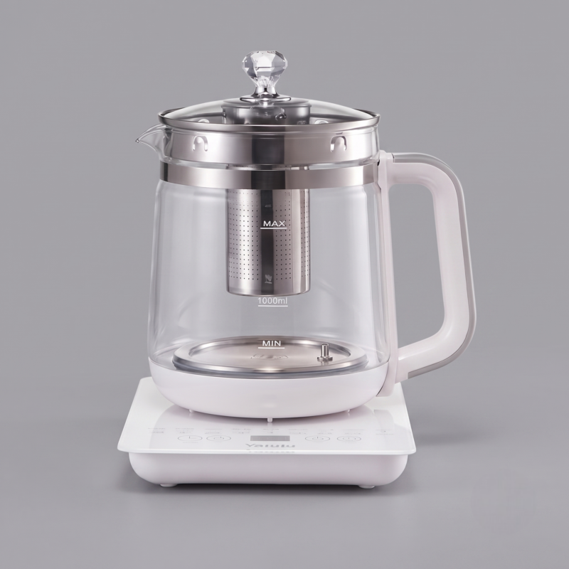 A clean product photo of the Electric Kettle 1.8L/60.87oz in its transparent glass pot and on its white control base. The central transparent kettle is clearly labeled with "MAX 1000ml" and "MIN" water level indicators, though the total capacity is stated as 1.8L in the surrounding text. The detachable stainless steel infuser is visible inside the water-filled pot. The control base features simple touch icons and "Valulu" text. The background is a solid grey.